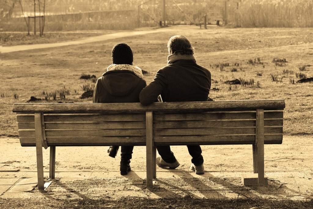 people, man, woman, couple, sitting, together, bench, talking, close, conversation, brown talk, brown talking, brown conversation, brown together, brown closed, talking, talking, talking, talking, conversation, conversation, conversation, conversation, conversation